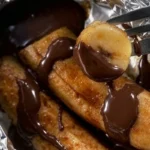 Recette de bananes en papillotes au chocolat noir et noisettes cuites au barbecue
