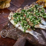 Recette de sardines grillées au brasero plancha avec persillade et citrons confits